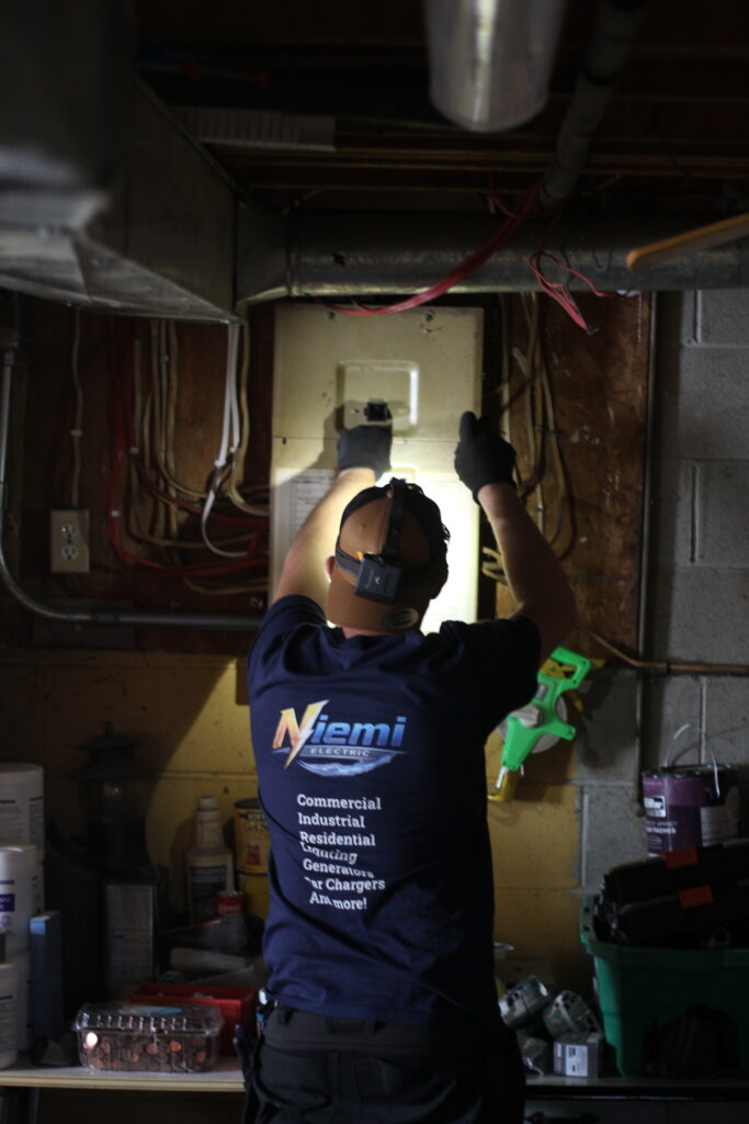 electrician working on panel, power loss on panel, panel upgrade, coldwater, ontario